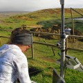 Tahira Edmunds downloading data from the environmental monitoring equipment on site.