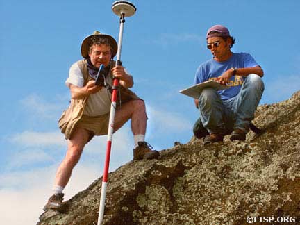 Bill White & Cristián Arévalo Pakarati surveying a moai during field season 2002. © EISP 2002.