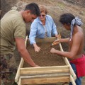 Jo Anne Van Tilburg, Benjamin Mihaore Pakarati González, and Carlos E. Rapu Rapu screening excavation deposits in Rano Raraku Quarry, 2010