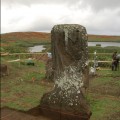 Overview of Moai 157 showing excavations of the first 50 cm levels to reveal petroglyphs.  Rano Raraku lake to the north.