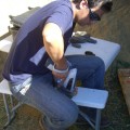 Rafael Paoa R. analyzing the elemental composition of the toki found during the excavation with a handheld XRF spectrometer.