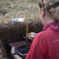 Dr. Sarah Sherwood collecting soil samples, Square 24. © EISP.ORG 2014